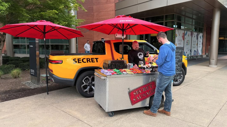 Secret Sausage stand and yellow truck at Microsoft Commons