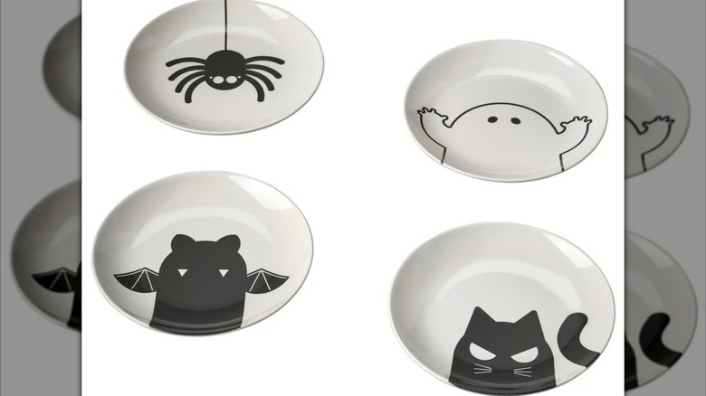 Product image of four black-and-white Halloween themed side plates