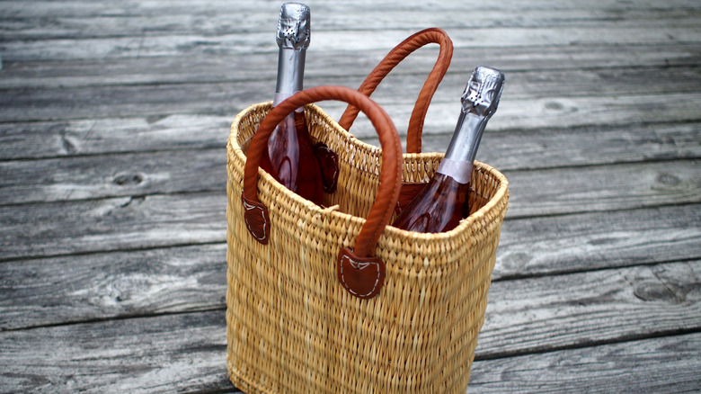 A wine tote bag with two bottles of wine