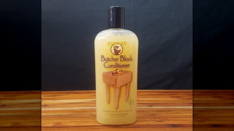 Bottle of Howard Butcher Block Conditioner on wooden table