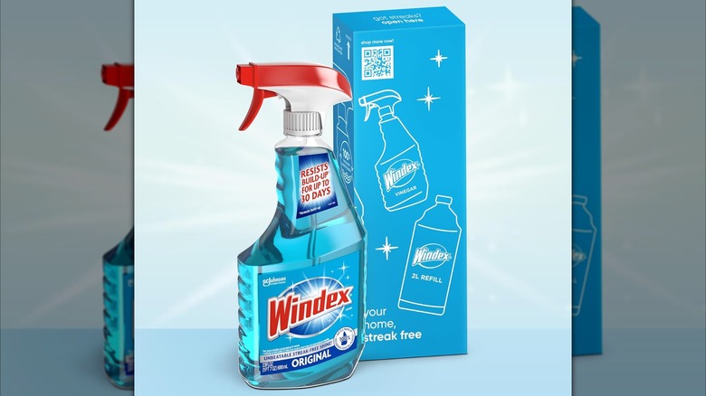 Windex Original bottle and box on blue background