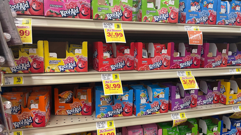 different Kool Aid flavors on groery shelves