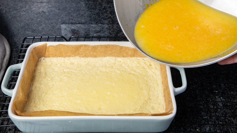 lemon filling pouring into pan