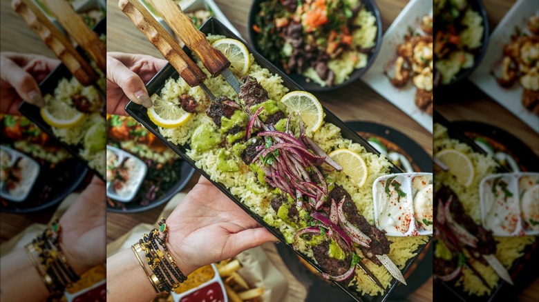 meat kabobs on a platter at Nicholas Restaurant