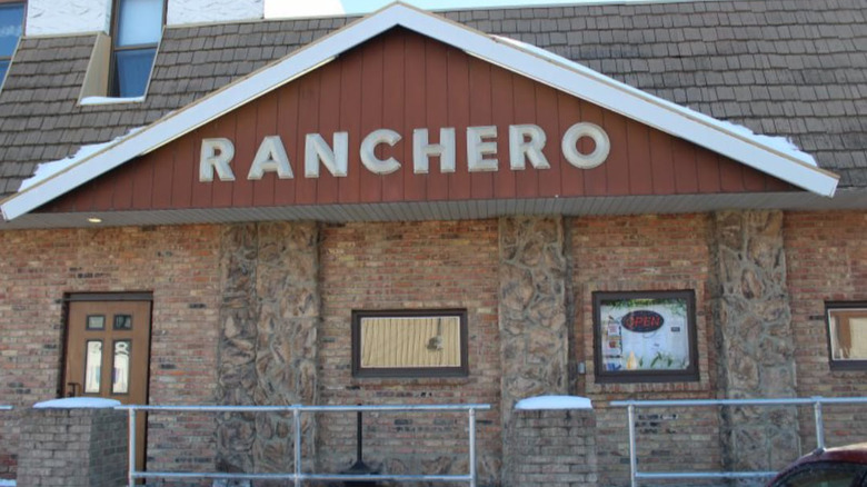 Brown building with a 'Ranchero" sign