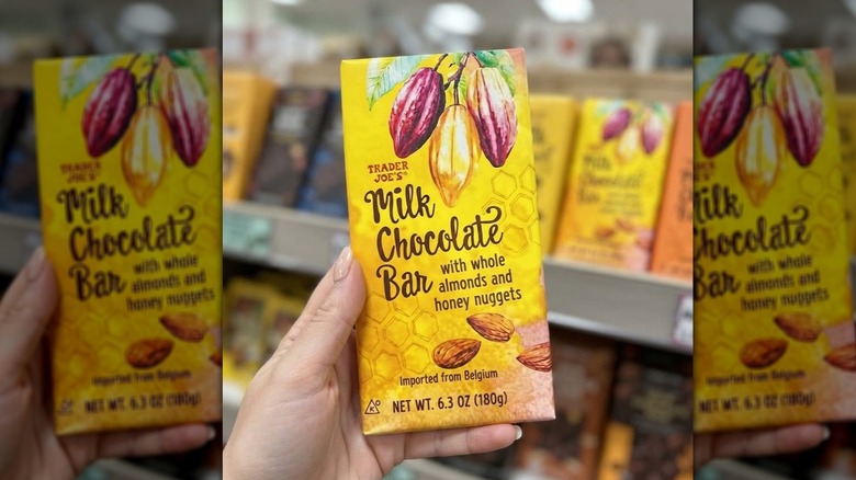 customer holding Trader Joe's chocolate