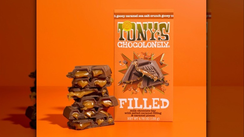 Stacked pieces of Tony's Chocoloney filled milk chocolate caramel sea salt bar