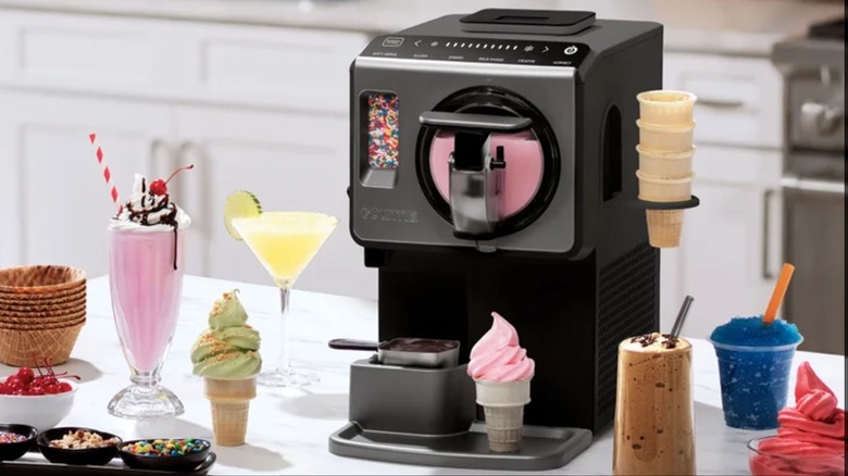 A Gourmia Soft Serve Ice Cream and Frozen Drink Maker on a kitchen counter
