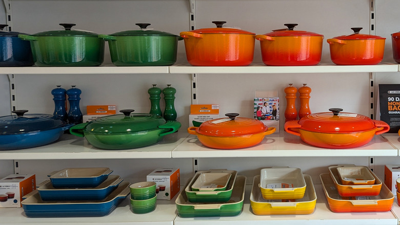 a colorful display of Le Creuset kitchen cookware