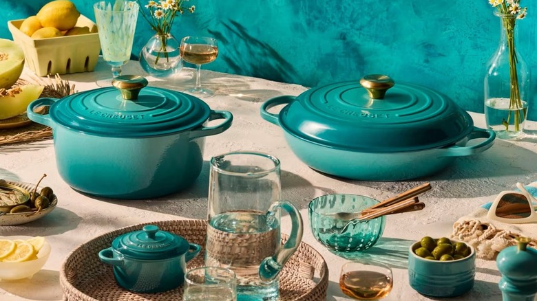 Le Creuset cast iron pots in Riviera teal color set on tablescape