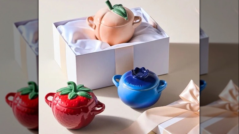 set of Le Creuset Fruit Cocottes in peach, blueberry, and strawberry