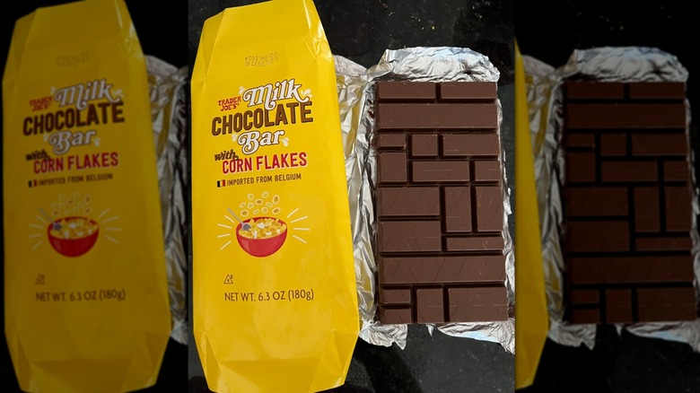 A Trader Joe's Milk Chocolate Bar with Corn Flakes open on a table
