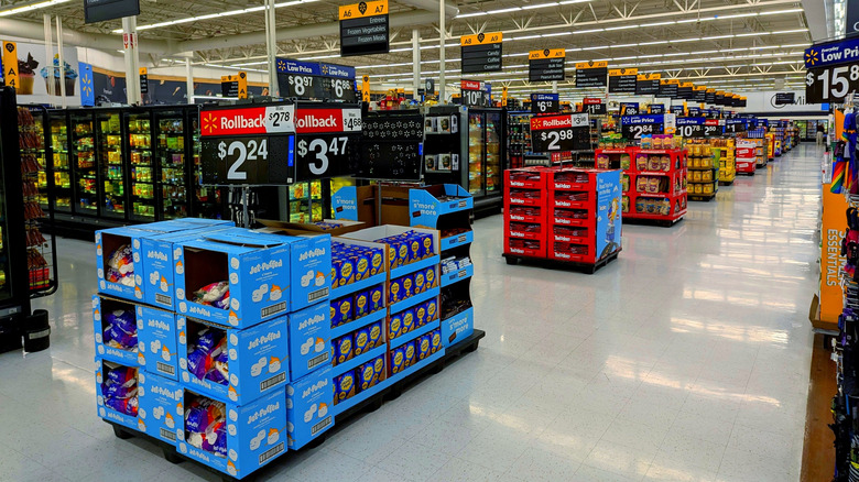 Grocery and freezer aisles in a Walmart store.
