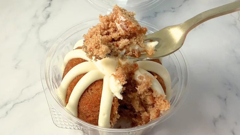 Carrot cake piece on a fork