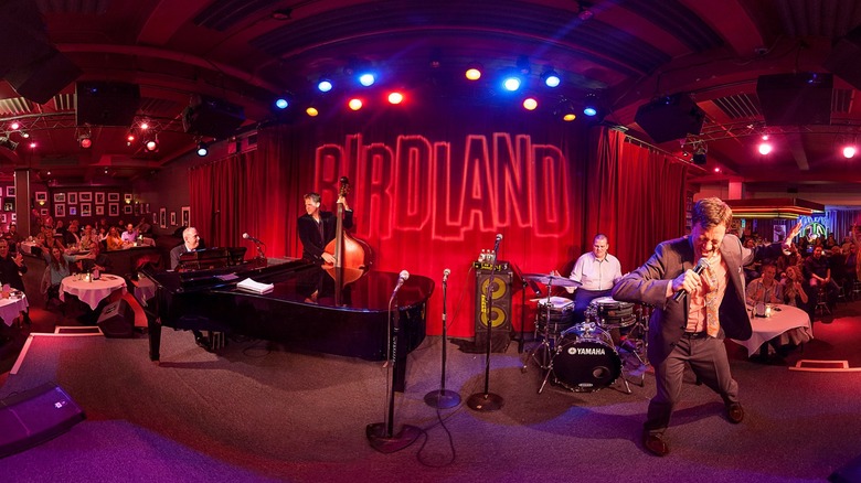 Fish-eye lens view of the stage and performers at Birdland