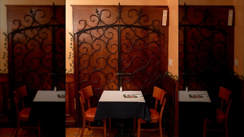 Restaurant table with iron wall