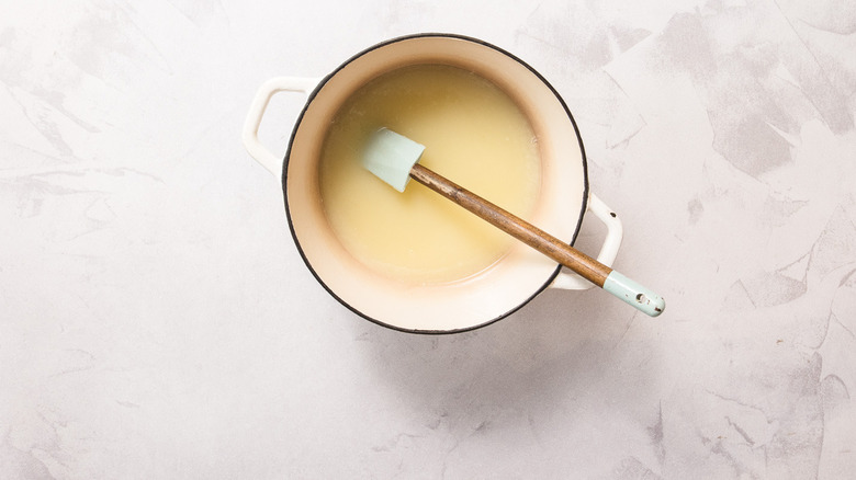 Cream and sugar in white pot