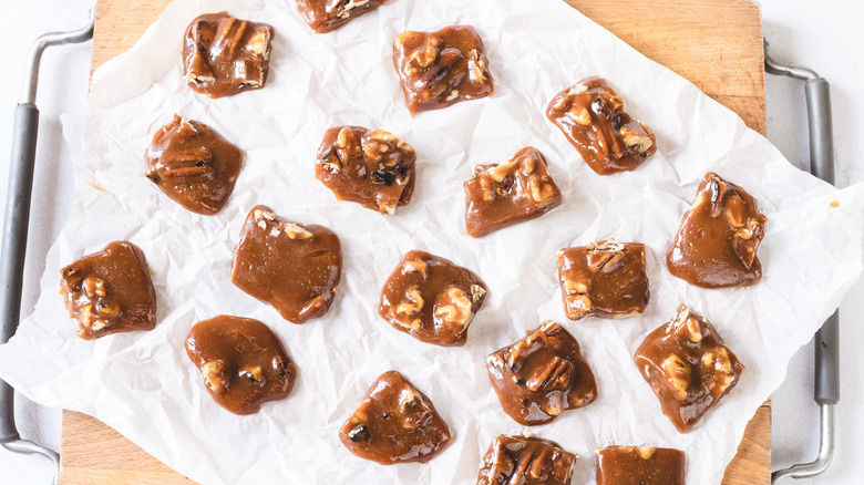 Oklahoma nut candy cut into pieces on wooden board