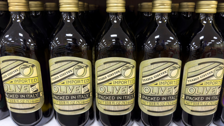 Bottles of Trader Joe's olive oil in a row