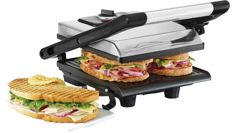 A Bella panini press cooking paninis