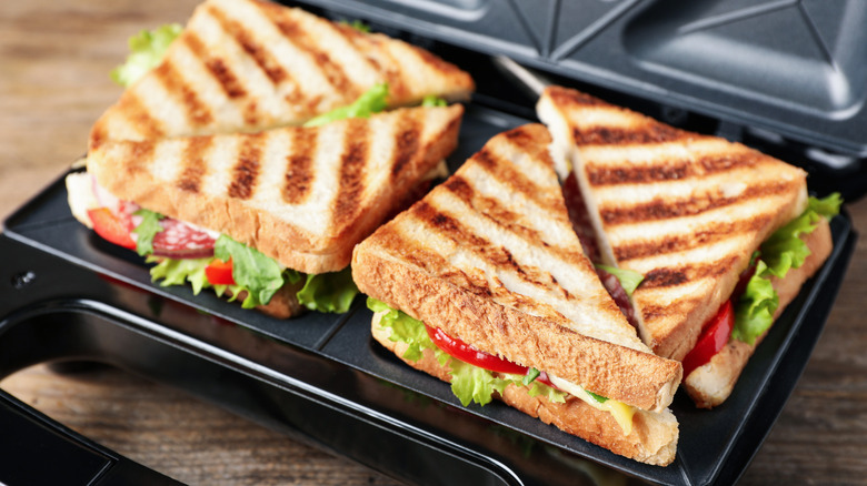 Grilled paninis on a press