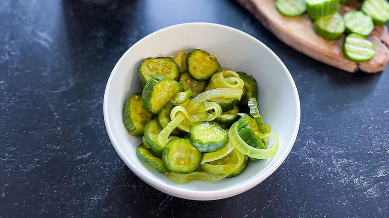 Bread and Butter Pickles in small white bowl