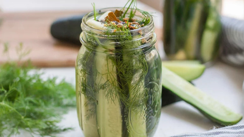 Classic dill pickles in glass jar