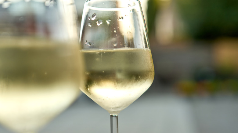 Close-up of two glasses of crisp white wine