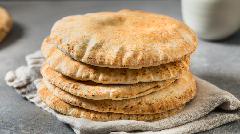 round pita bread pieces stacked