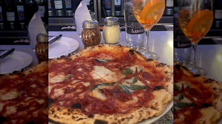 Pizza with a cocktail
