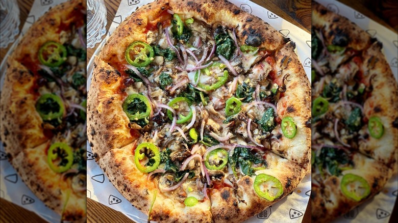 Pizza with spinach and spice