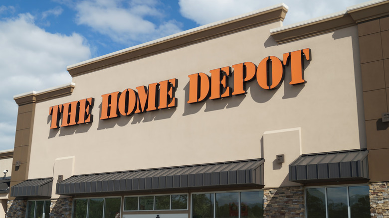 Exterior of Home Depot with store logo sign in orange