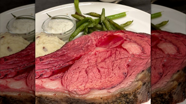 Prime rib with mash, green beans, and horseradish