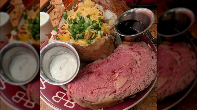 Prime rib and loaded baked potato with horseradish