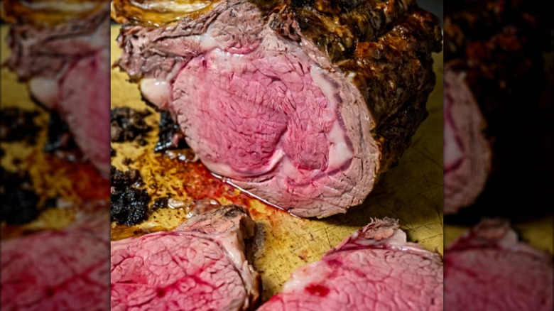 Prime rib roast and several slices