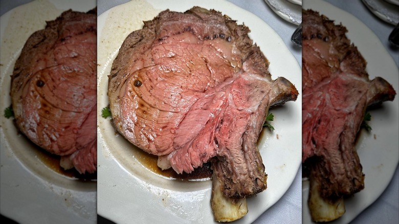 Bone-in prime rib slice on plate
