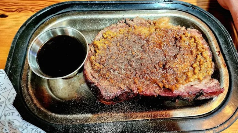 Prime rib with topping and au jus