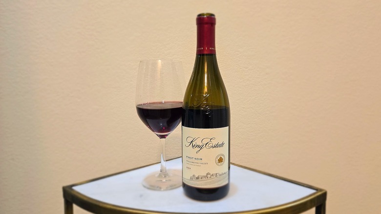 Bottle of King Estate Willamette Valley Pinot Noir and glass