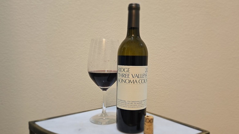 Bottle of Ridge Vineyards Three Valleys Red Blend and glass