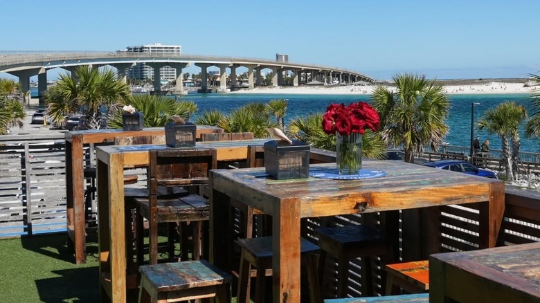 Tables overlooking the water at The Gulf Restaurant