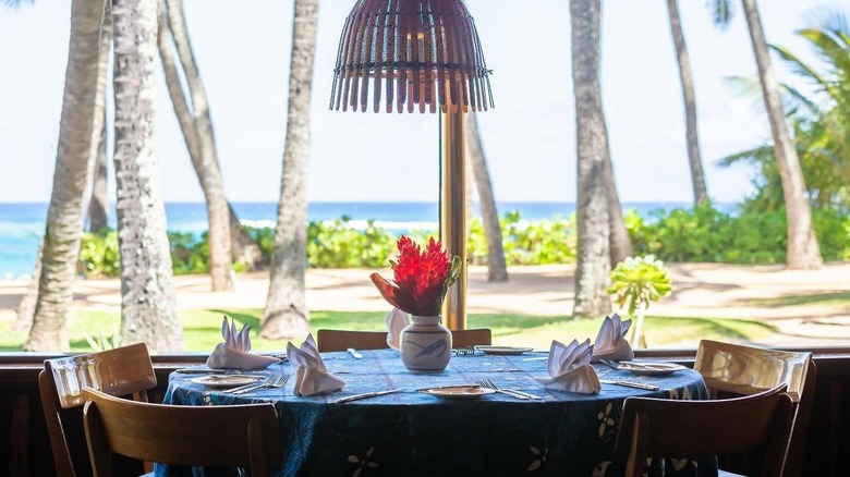 Set table with the surf in the background