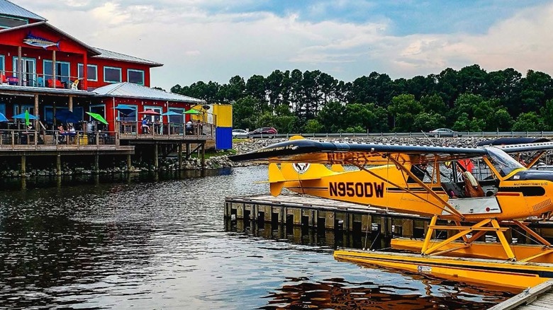 View of the beach and tables at Shaggy's in Biloxi Beach