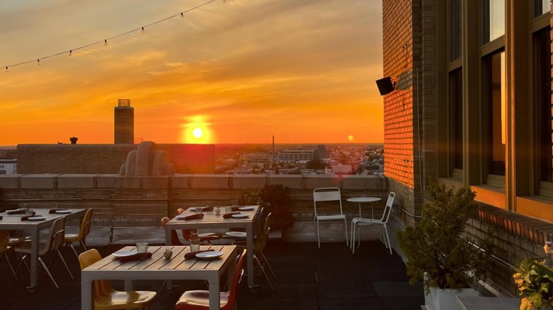 Tables and view from the rooftop terrace at Irwin's