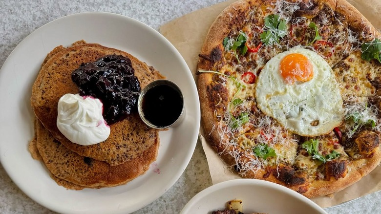 gluten-free pancakes and pizza on table
