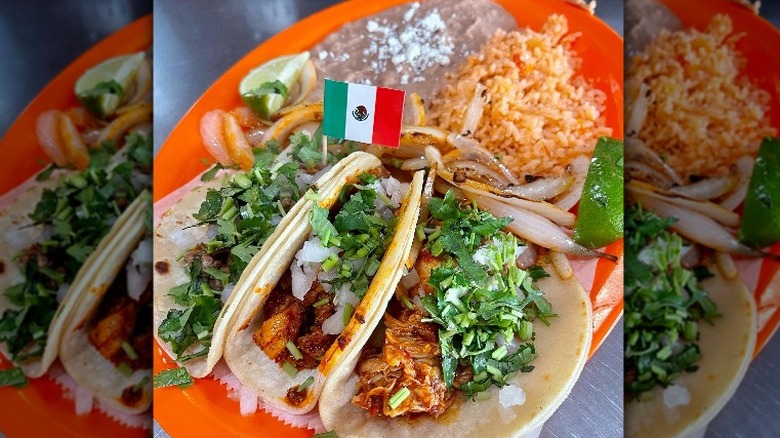 Quesabirria with consommé in tray