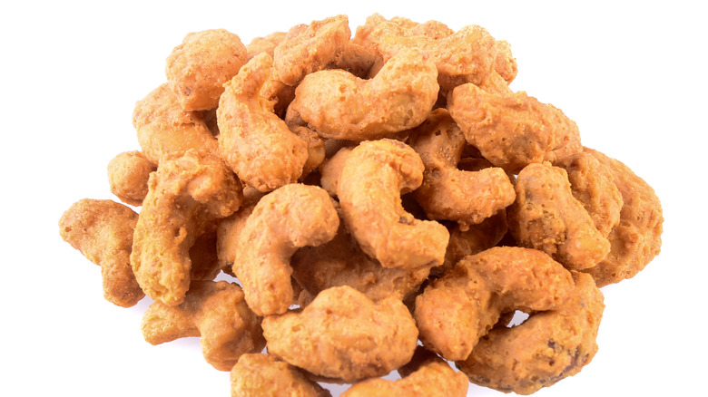 Roasted cashews on white background