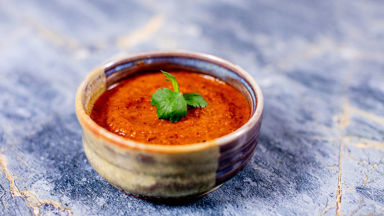 Easy Salsa in grey bowl on blue table