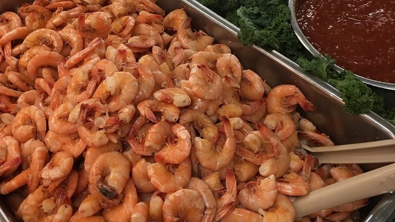 Unpeeled shrimp on a tray at Hollis Seafood Buffet