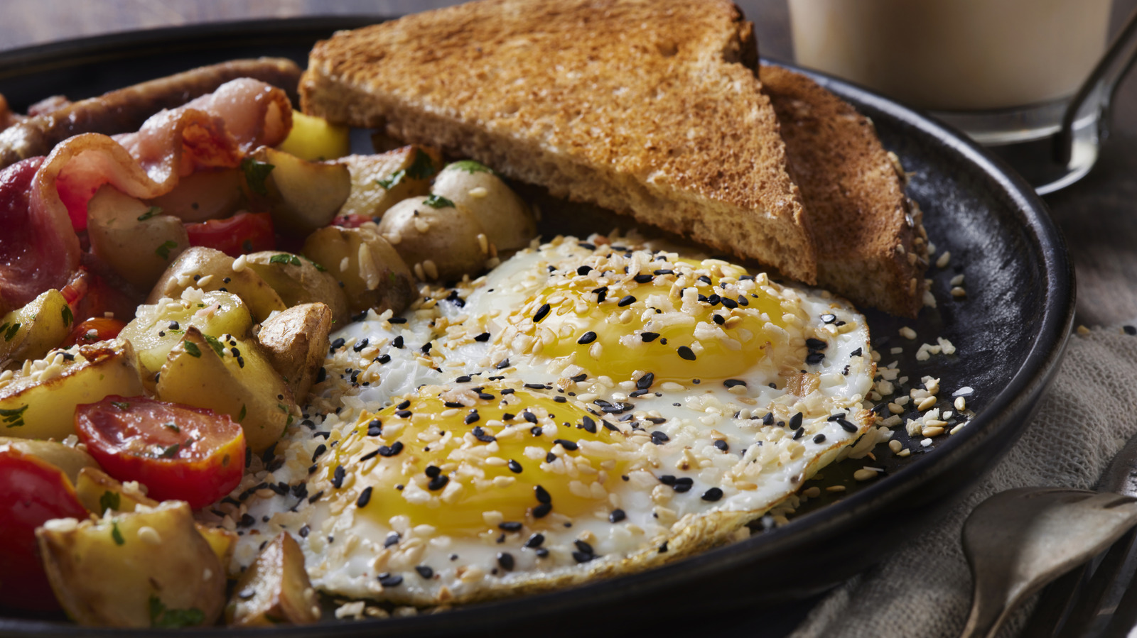 Most People Keep This Seasoning In Their Pantry - And It's The Perfect Pairing For Eggs, Any Style - Tasting Table