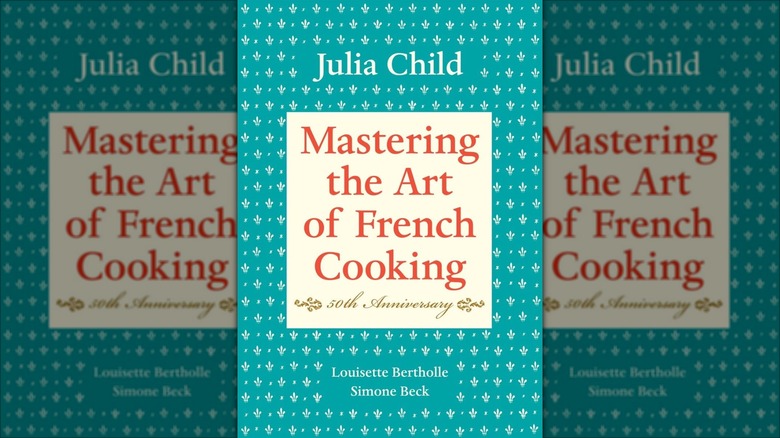 Blue and red cover of Mastering the Art of French Cooking 50th anniversary edition